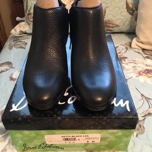 Brand new (never worn) black booties.